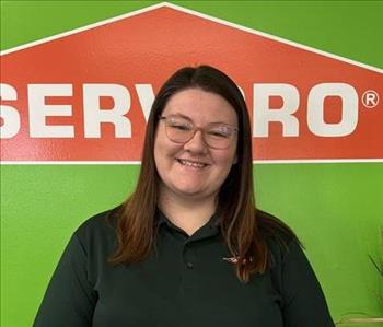 Regan in front of the SERVPRO wall